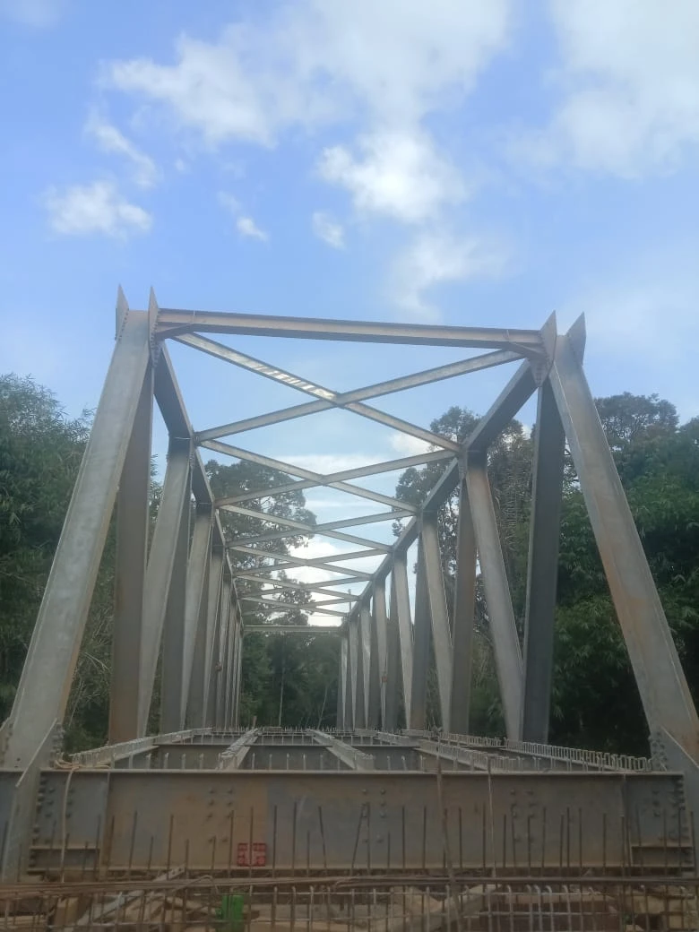Proyek Jembatan Rangka Type-C40M Jembatan Sui Keberak Desa Langan Kec. Belimbing - Gunung Baja Permata - Fatimano Daeli